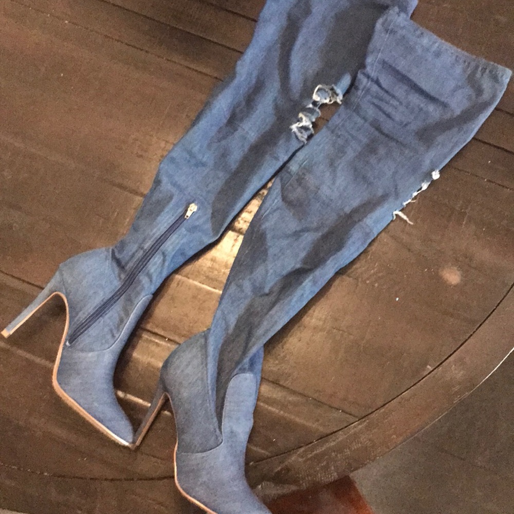 Thigh high distressed denim boots